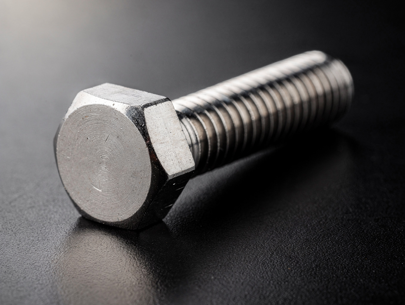Macro close-up of Grade 5 titanium pivot screw